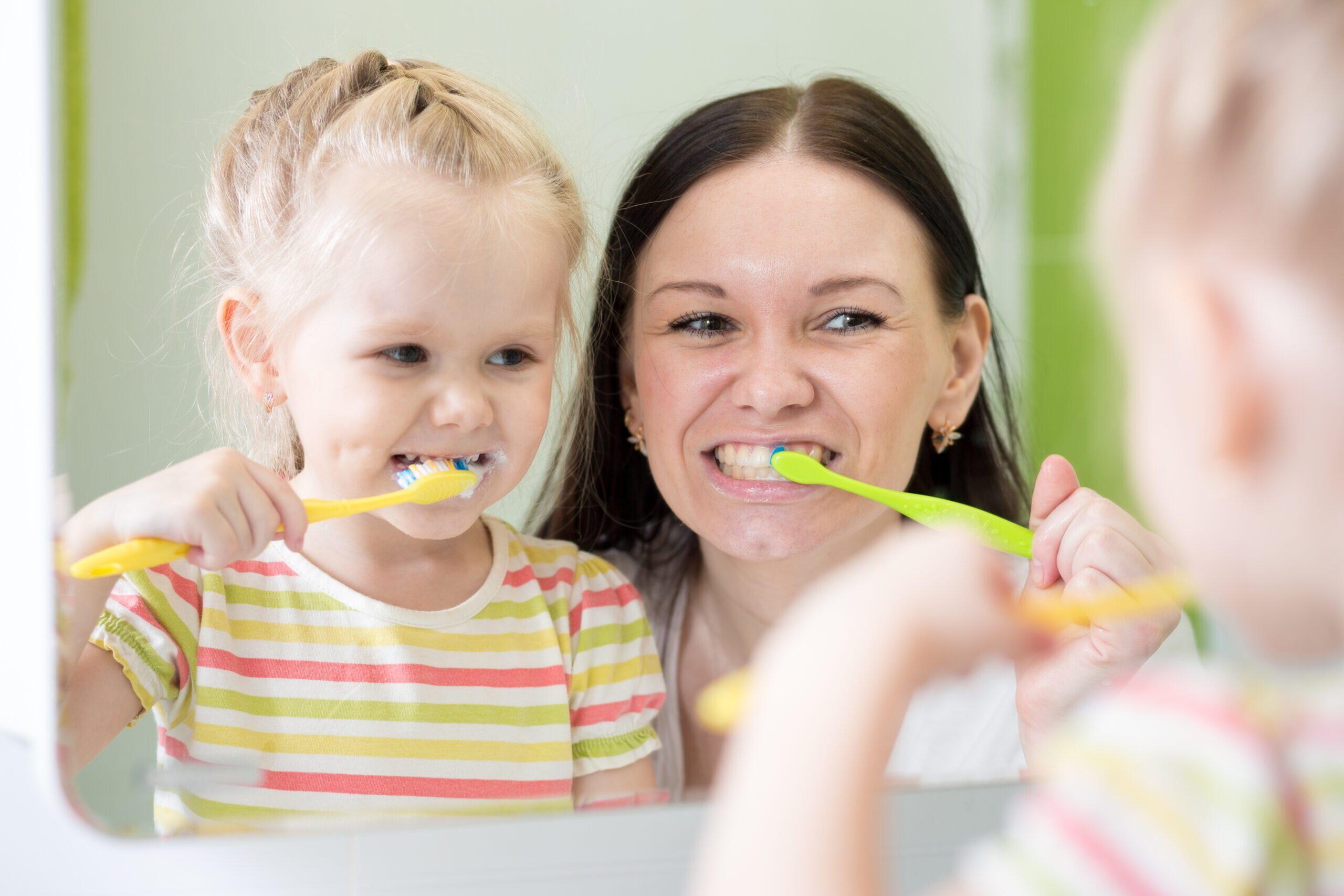 Mother,And,Kid,Daughter,Brushing,Teeth,Together