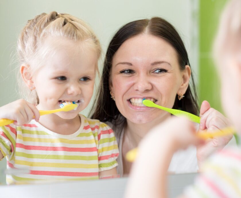Mother,And,Kid,Daughter,Brushing,Teeth,Together